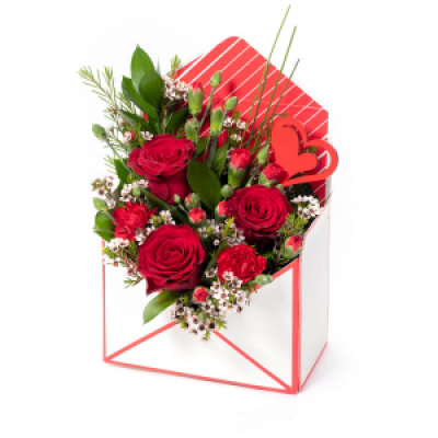 Love Letter - Send a message straight from your heart with this delightful envelope arrangement of romantic flowers